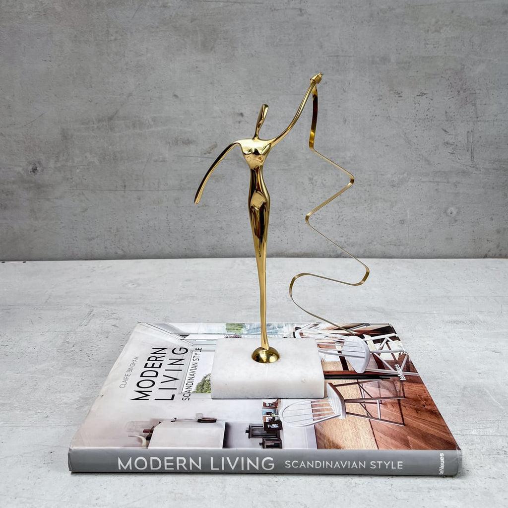 Brass metal artifact