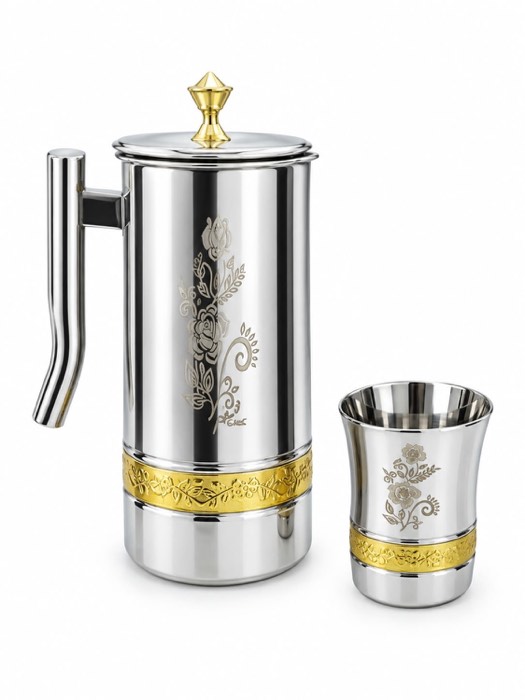 Engraved silver jug with a gold band and matching tumbler