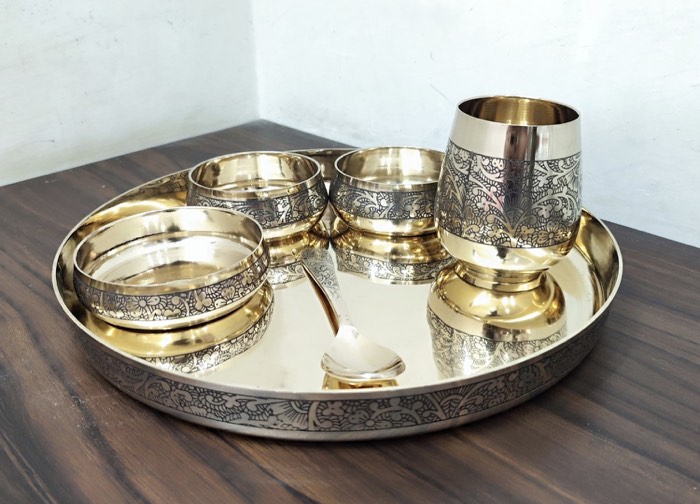 Large brass thali with matching bowls and glass